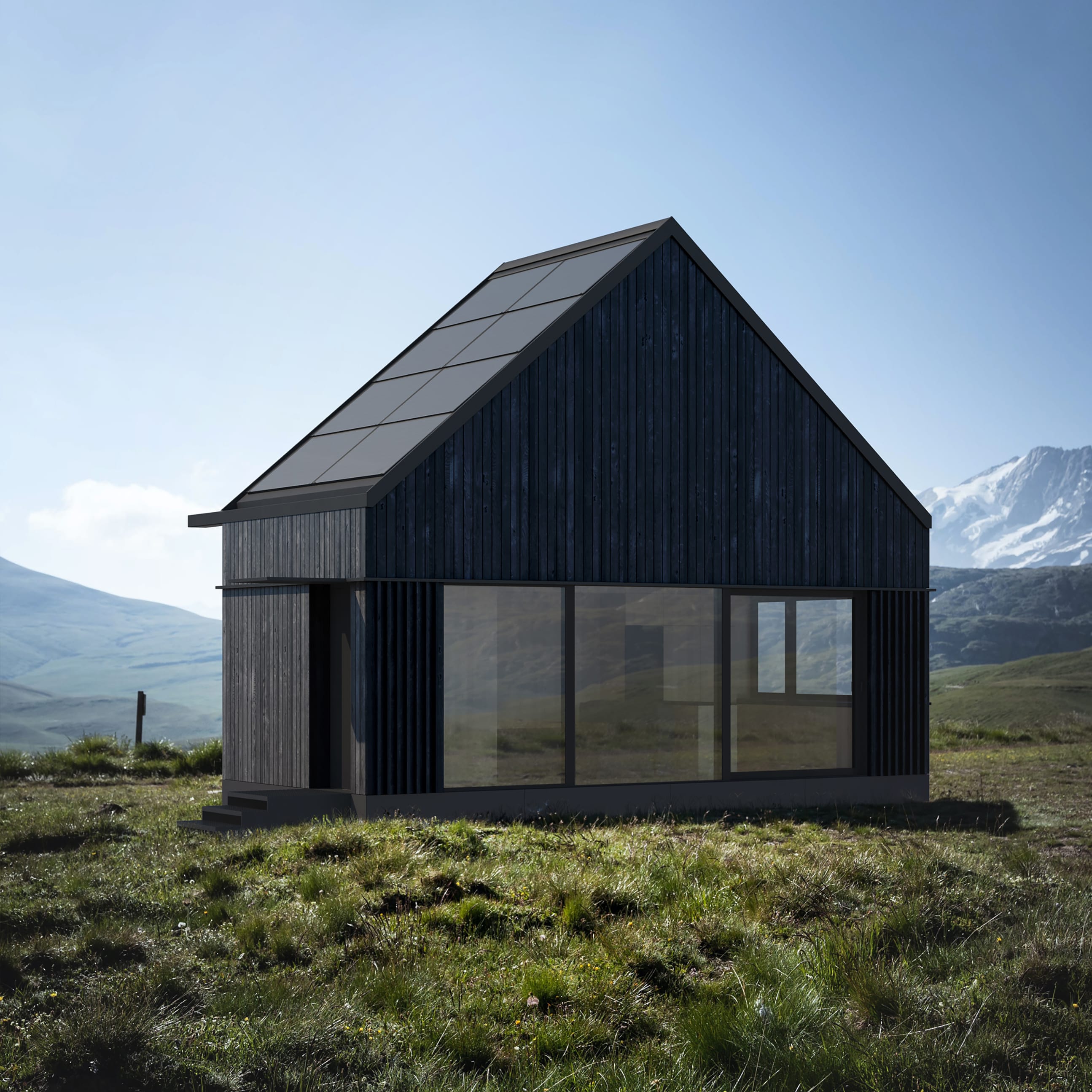 A dark, minimalist house with solar panels on the roof stands on a green hill. In the background, you can see snow-capped mountain peaks.