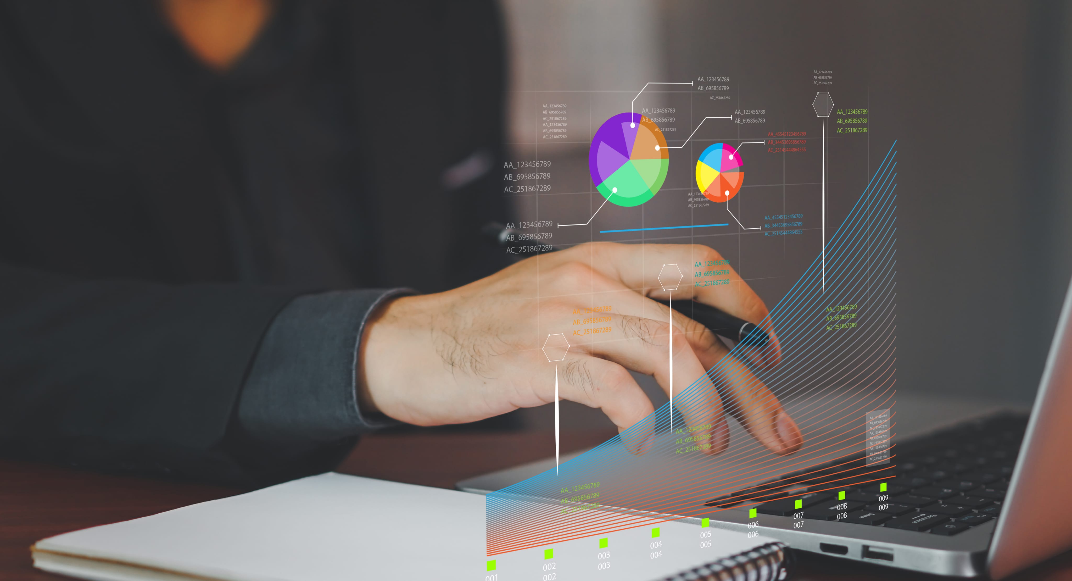 A group of people in a modern office looking at a laptop screen.