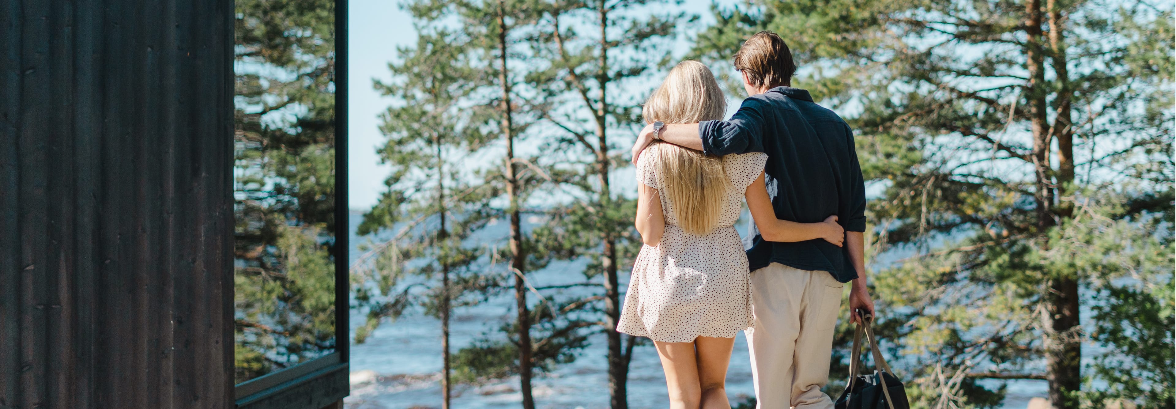 The interior of a luxurious hotel room with a forest view