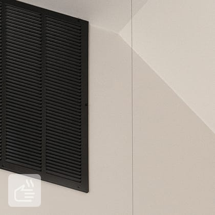 Three black, round ventilation nozzles mounted in a long, black profile under the ceiling. A white WiFi access point is also visible.