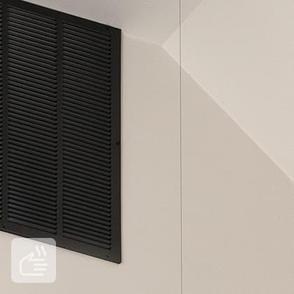 Three black, round ventilation nozzles mounted in a long, black profile under the ceiling. A white WiFi access point is also visible.